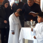 Joel Vera døper. Carmen og Gonzalo er faddere.